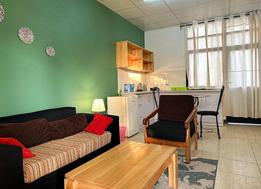 City Center Apartments บุจัมบุรา ภายนอก รูปภาพ